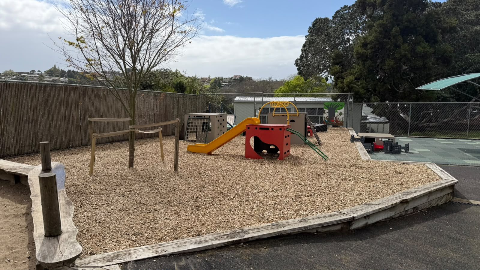 Early childhood centre play area surfaced with Cushionfall® woodchip