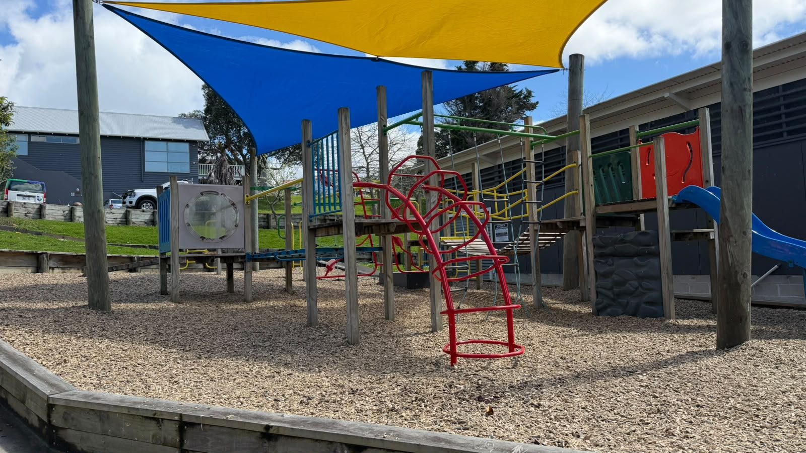 School climbing frame and slide with Cushionfall® safety surfacing